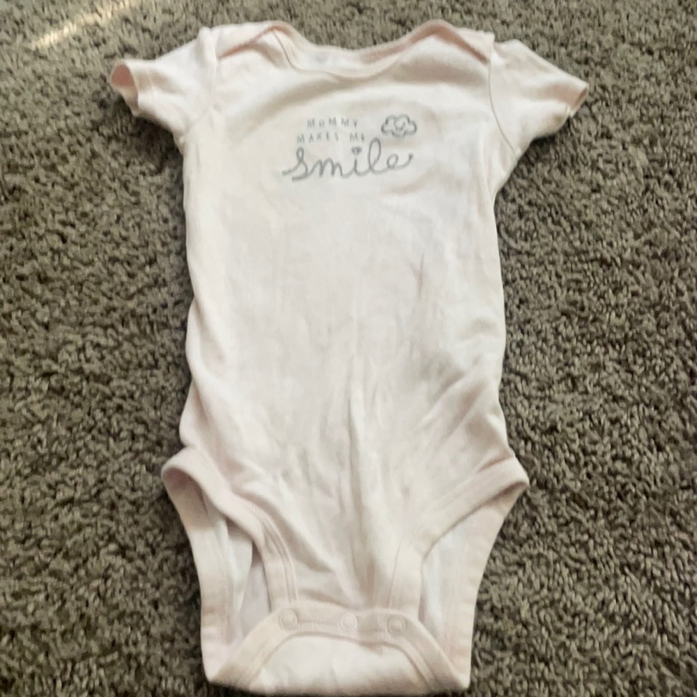 Pink Carter’s onesie